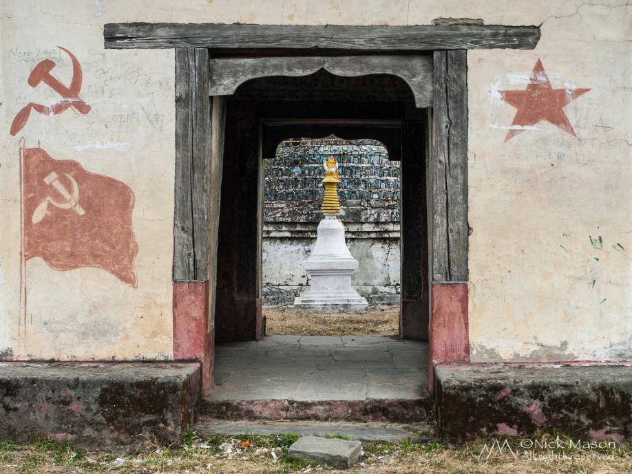 06 Maoist graffiti from the 1996 to 2006 civil war on the entrance to a Buddhist stupa 