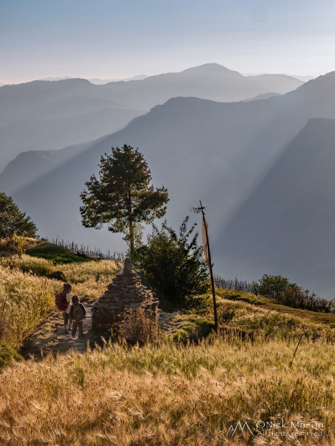 24 School children make their way home near the village of Sermathang