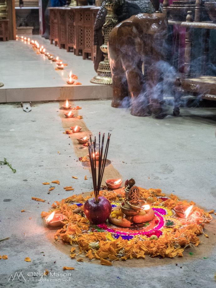 07 A rangoli decorates a shop for the third night of Tihar
