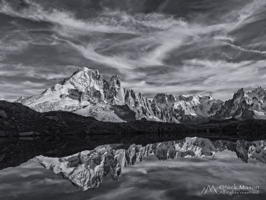 11 The Aiguille Verte, Drus and Grandes Jorasses reflected in the Lac des Cheserys